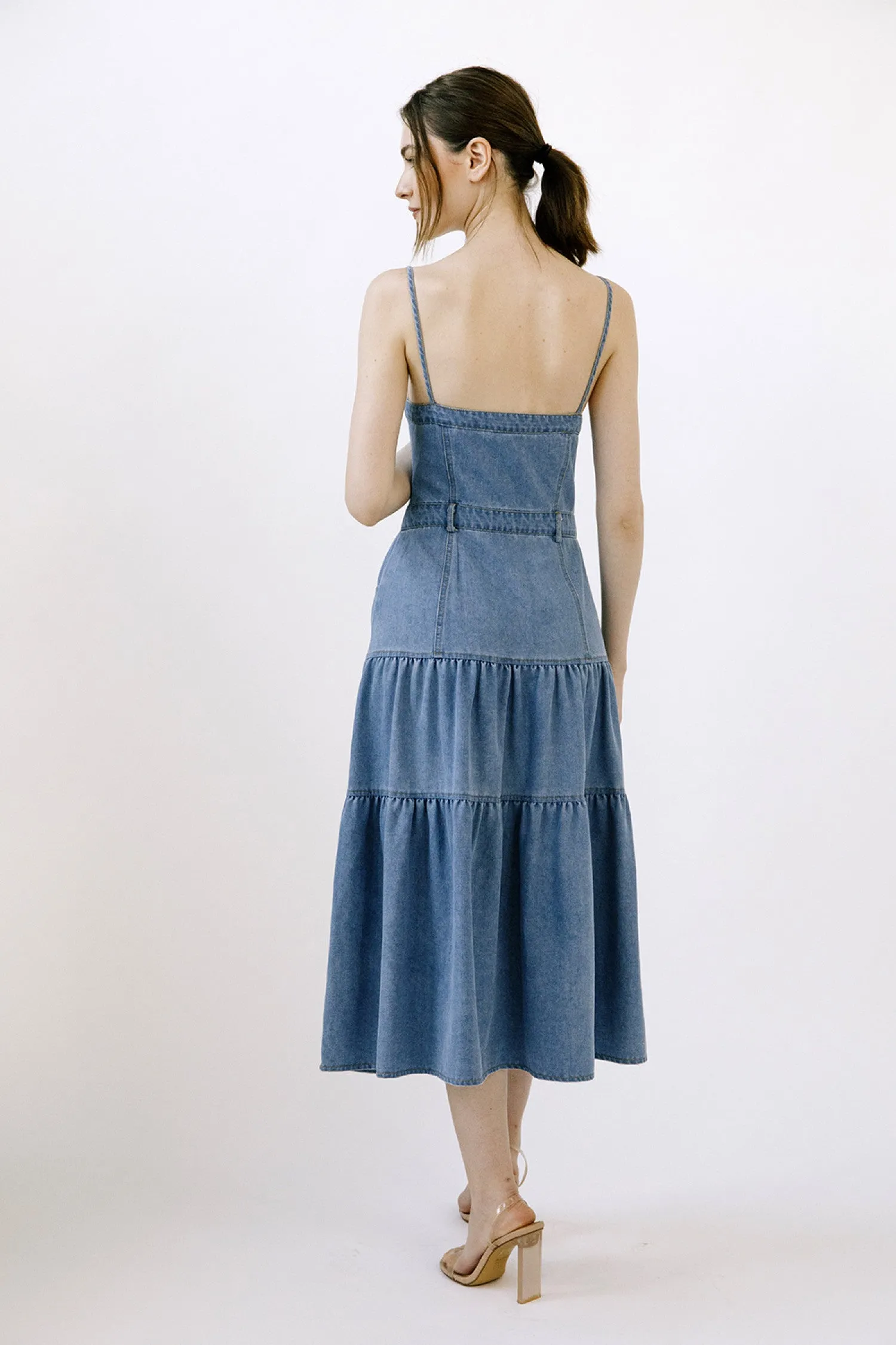 Certainly! To optimize the title of an e-commerce product like the Ashton Denim Dress, we can add modifiers to highlight key features and benefits that might attract more customers. Heres an optimized version:

Ashton Womens Casual Denim Dress with Short Sleeves and Front Pockets

This title includes:

1. **Target Audience**: Womens specifies who the dress is for.
2. **Style/Occasion**: Casual suggests the intended use or style of the dress.
3. **Material**: Denim highlights the material, which is often a selling point.
4. **Design Features**: Short Sleeves and Front Pockets provide additional details that shoppers might be looking for.

This optimized title provides more information and can draw in potential buyers by addressing specific preferences and needs.