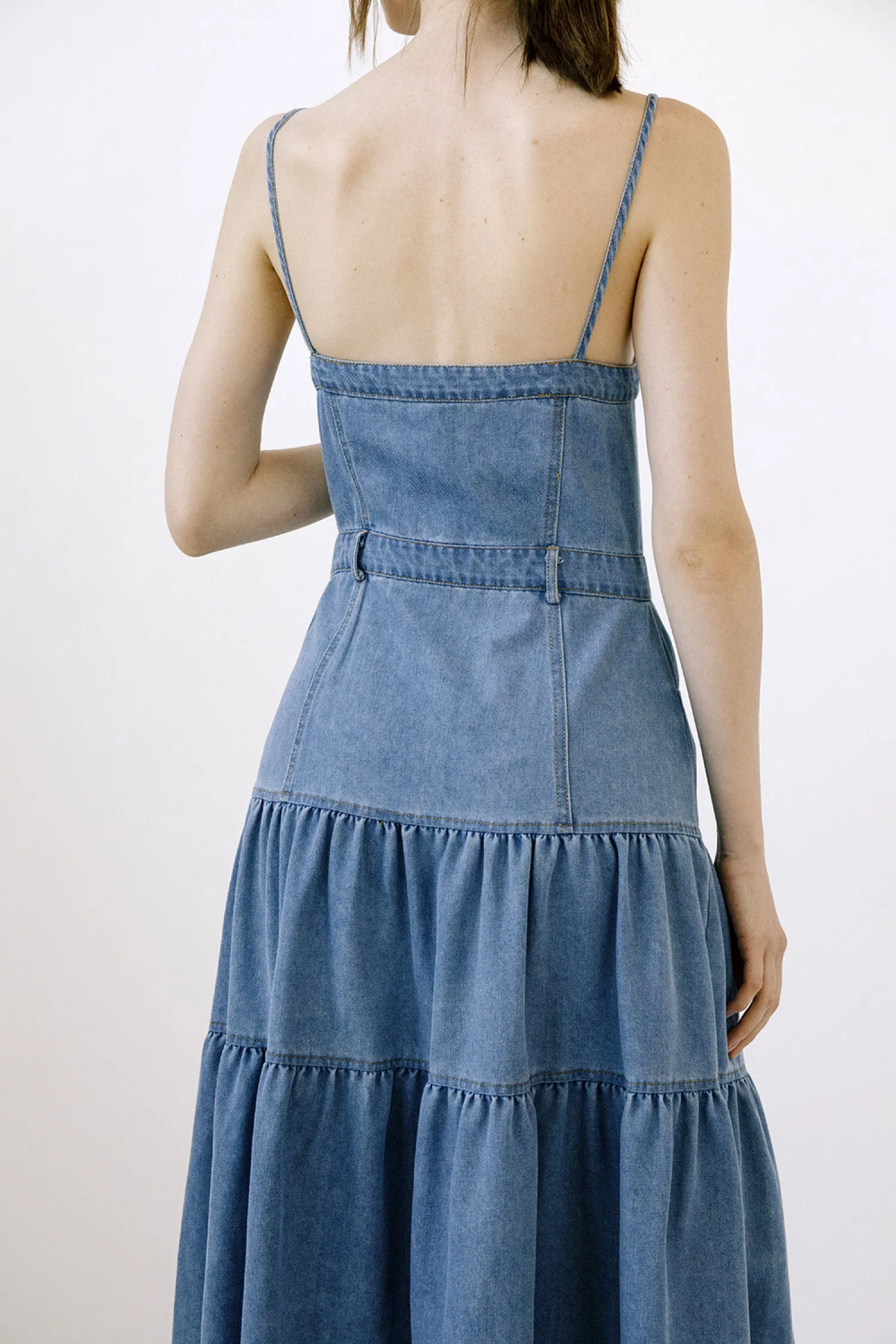 Certainly! To optimize the title of an e-commerce product like the Ashton Denim Dress, we can add modifiers to highlight key features and benefits that might attract more customers. Heres an optimized version:

Ashton Womens Casual Denim Dress with Short Sleeves and Front Pockets

This title includes:

1. **Target Audience**: Womens specifies who the dress is for.
2. **Style/Occasion**: Casual suggests the intended use or style of the dress.
3. **Material**: Denim highlights the material, which is often a selling point.
4. **Design Features**: Short Sleeves and Front Pockets provide additional details that shoppers might be looking for.

This optimized title provides more information and can draw in potential buyers by addressing specific preferences and needs.