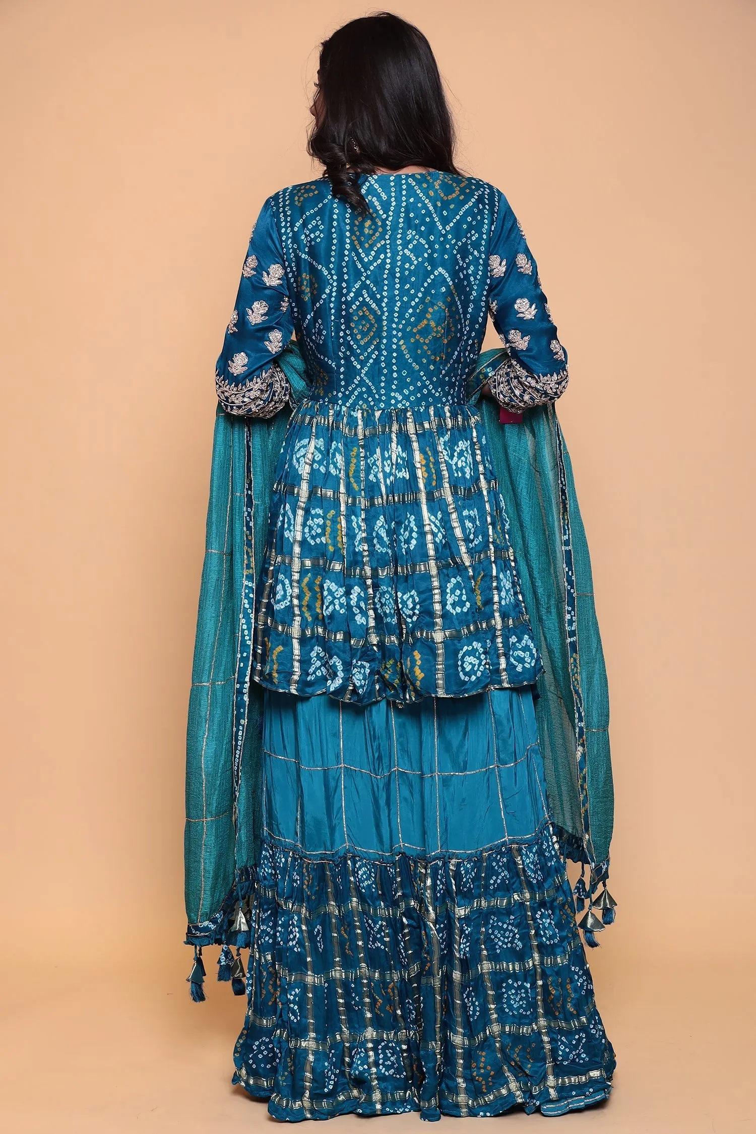 Bandhej ghatchola peplum kurta with skirt and zardozi embroidery.